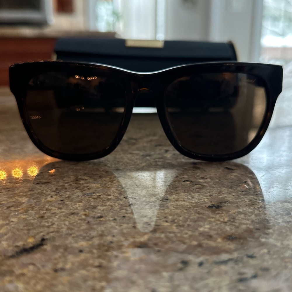Chopard Brown sunglasses with case and authenticity card.